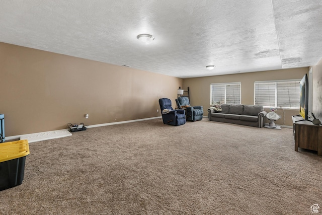5454 N Windsor Way E, Stansbury Park, UT 84074 - carpeted living area featuring a textured ceiling and baseboards