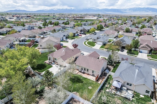 5454 N Windsor Way E, Stansbury Park, UT 84074 - aerial perspective of suburban area featuring a mountain backdrop