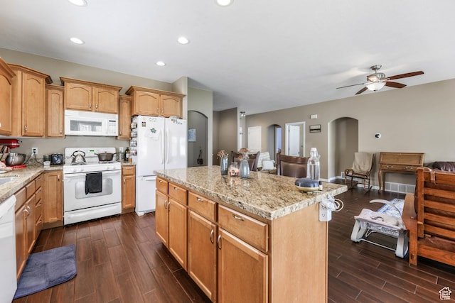 5454 N Windsor Way E, Stansbury Park, UT 84074 - kitchen featuring white appliances, arched walkways, a ceiling fan, dark wood-style flooring, and recessed lighting