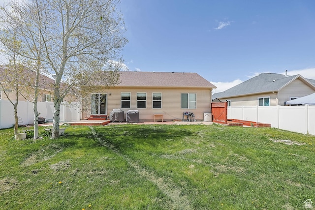 5454 N Windsor Way E, Stansbury Park, UT 84074 - back of house featuring a fenced backyard and a patio area
