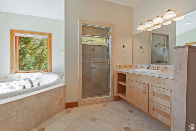 152 N Silver Oak Rd, Salt Lake City, UT 84108 - full bath with tile patterned floors, a stall shower, a garden tub, and vanity