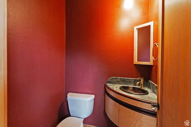152 N Silver Oak Rd, Salt Lake City, UT 84108 - half bath with toilet, a textured wall, and vanity