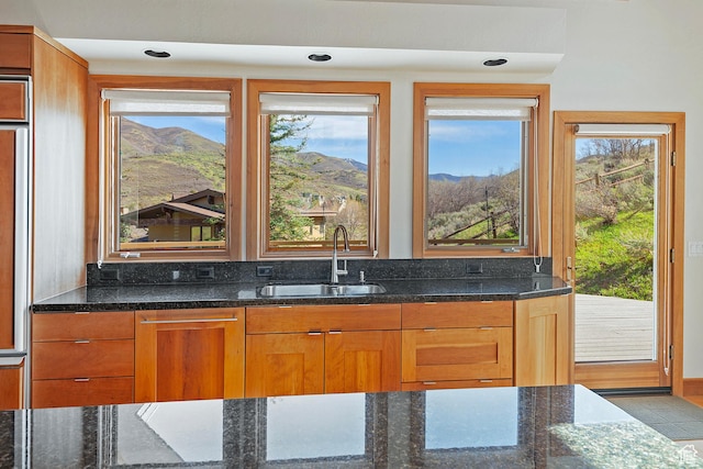 152 N Silver Oak Rd, Salt Lake City, UT 84108 - interior space with recessed lighting, a mountain view, and a sink