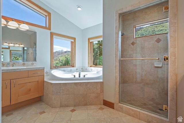 152 N Silver Oak Rd, Salt Lake City, UT 84108 - bathroom featuring lofted ceiling, a shower stall, plenty of natural light, and a bath