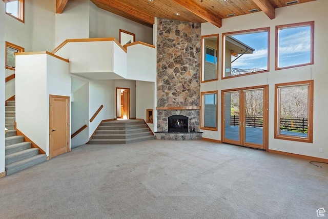 152 N Silver Oak Rd, Salt Lake City, UT 84108 - unfurnished living room featuring a high ceiling, carpet flooring, stairway, and wood ceiling