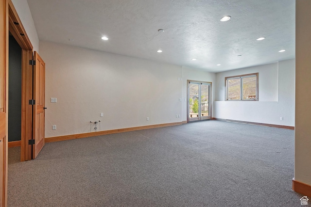 152 N Silver Oak Rd, Salt Lake City, UT 84108 - carpeted empty room with a textured ceiling, recessed lighting, and baseboards