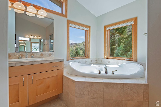 152 N Silver Oak Rd, Salt Lake City, UT 84108 - full bath featuring vanity, plenty of natural light, a bath, and vaulted ceiling