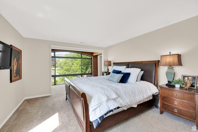 171 E 3rd Ave Unit 301, Salt Lake City, UT 84103 - bedroom featuring light carpet and baseboards