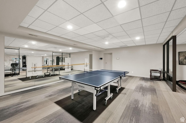 171 E 3rd Ave Unit 301, Salt Lake City, UT 84103 - playroom with baseboards, visible vents, carpet flooring, and a paneled ceiling