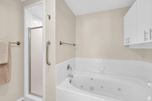 171 E 3rd Ave Unit 301, Salt Lake City, UT 84103 - bathroom featuring a shower stall and a jetted tub