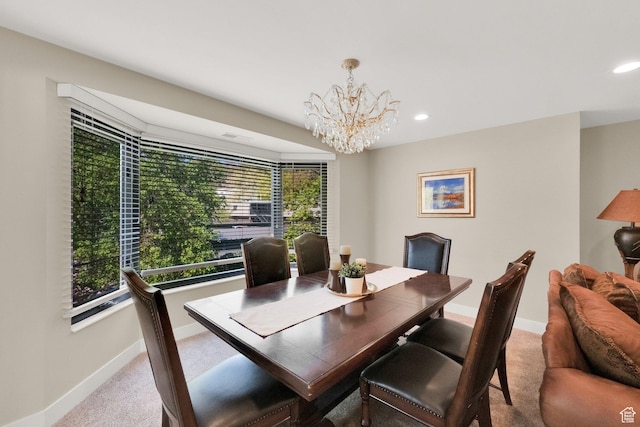 171 E 3rd Ave Unit 301, Salt Lake City, UT 84103 - dining space with baseboards, recessed lighting, an inviting chandelier, and carpet