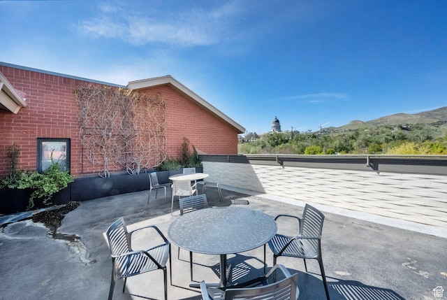 171 E 3rd Ave Unit 301, Salt Lake City, UT 84103 - view of patio with a mountain view and outdoor dining space