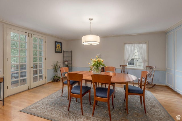 1280 E 3rd Ave N, Salt Lake City, UT 84103 - dining area featuring light wood-style floors, french doors, and crown molding