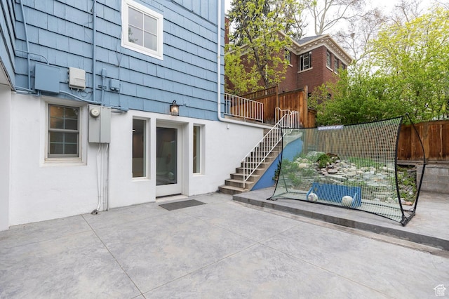 1280 E 3rd Ave N, Salt Lake City, UT 84103 - view of patio / terrace with fence and stairs