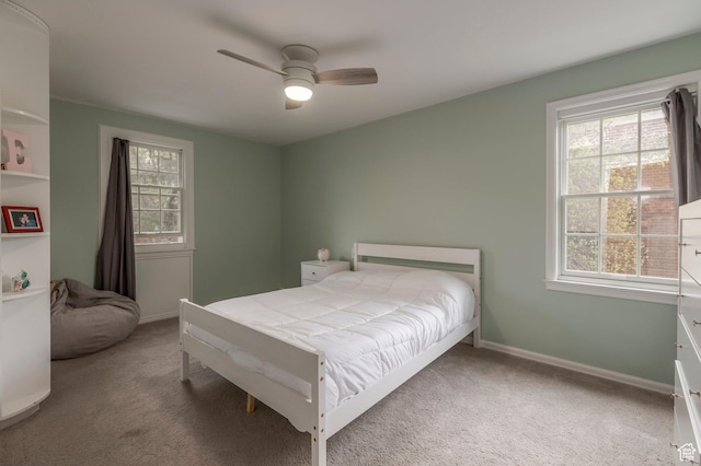 1280 E 3rd Ave N, Salt Lake City, UT 84103 - bedroom with ceiling fan, carpet flooring, and multiple windows