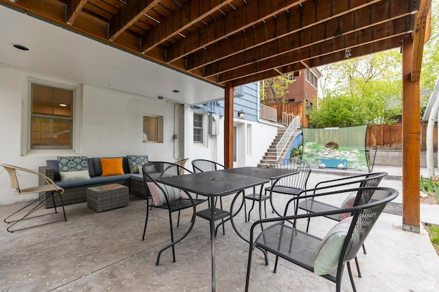1280 E 3rd Ave N, Salt Lake City, UT 84103 - view of patio / terrace featuring an outdoor hangout area, stairs, outdoor dining area, and fence