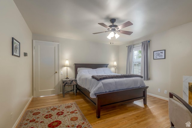 1280 E 3rd Ave N, Salt Lake City, UT 84103 - bedroom featuring a ceiling fan, light wood-style flooring, and baseboards