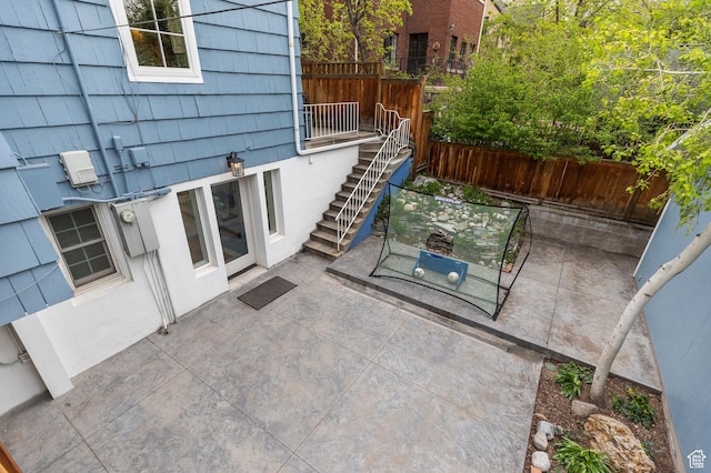 1280 E 3rd Ave N, Salt Lake City, UT 84103 - view of patio featuring stairway and fence