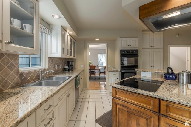 1280 E 3rd Ave N, Salt Lake City, UT 84103 - kitchen featuring a sink, light tile patterned floors, tasteful backsplash, black appliances, and white cabinets