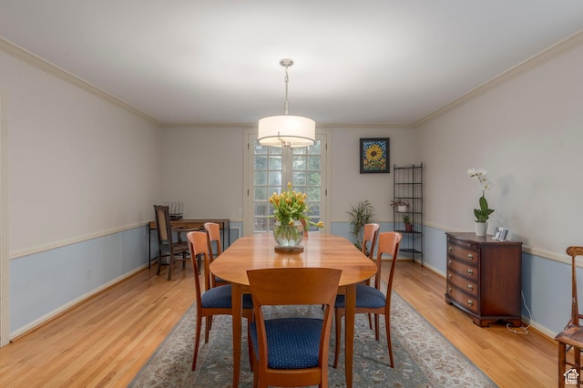 1280 E 3rd Ave N, Salt Lake City, UT 84103 - dining area featuring ornamental molding, baseboards, and light wood-type flooring