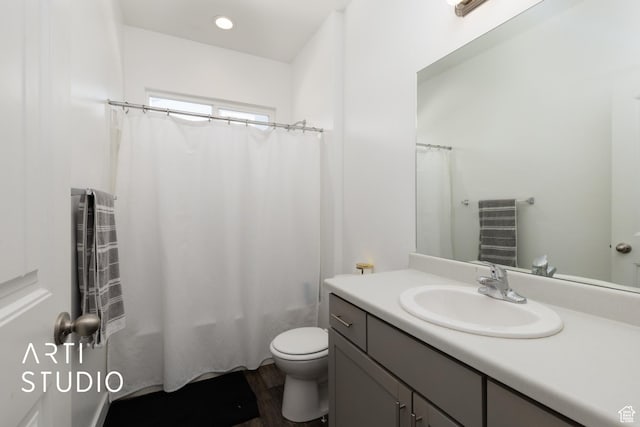 661 W 1820 S, Provo, UT 84601 - full bath with shower / tub combo, wood finished floors, toilet, and vanity