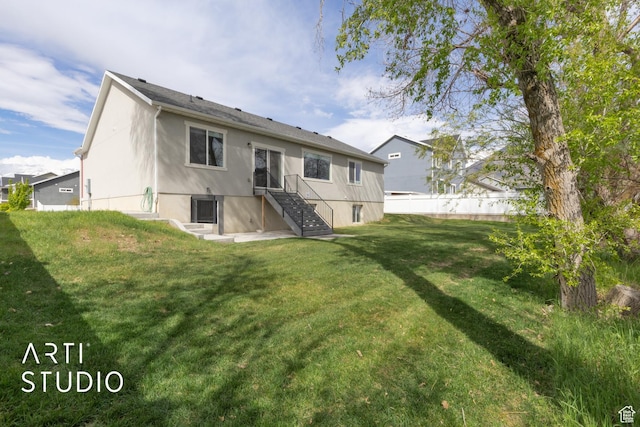 661 W 1820 S, Provo, UT 84601 - back of property with a yard, stucco siding, and fence