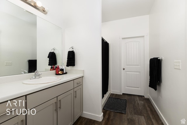 661 W 1820 S, Provo, UT 84601 - bathroom featuring baseboards, wood finished floors, a shower with curtain, and vanity