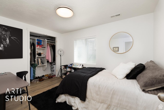 661 W 1820 S, Provo, UT 84601 - bedroom with a closet, visible vents, and wood finished floors
