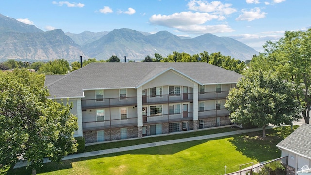 1514 S 200 E, Orem, UT 84058 - back of property with a yard, a mountain view, and roof with shingles