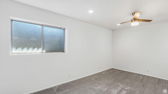 empty room with baseboards, recessed lighting, ceiling fan, and carpet floors