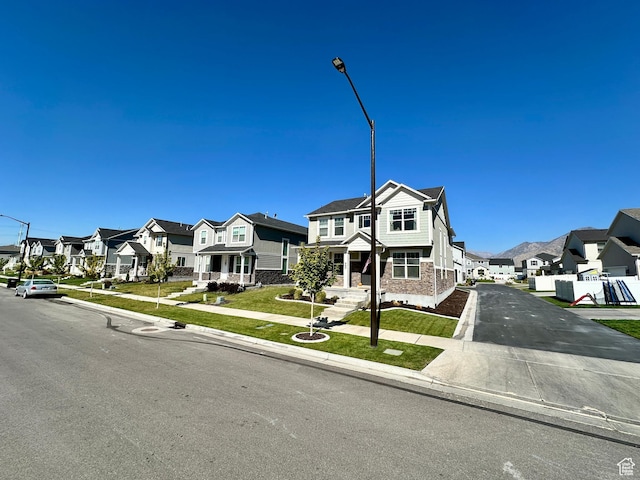 980 W 1275 S, Springville, UT 84663 - view of front of home featuring a front lawn, a residential view, and driveway