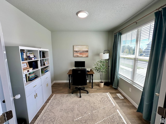 980 W 1275 S, Springville, UT 84663 - office area with a textured ceiling, visible vents, wood finished floors, and baseboards