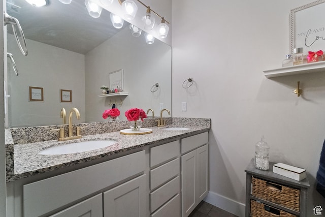 6463 W Maple Valley Cir S Unit 1030, West Jordan, UT 84081 - full bathroom featuring double vanity, a sink, tile patterned floors, and baseboards
