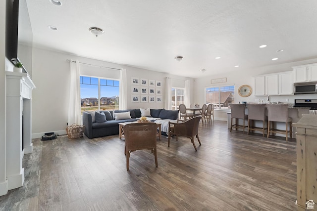 6463 W Maple Valley Cir S Unit 1030, West Jordan, UT 84081 - living area featuring recessed lighting, dark wood-style flooring, and baseboards