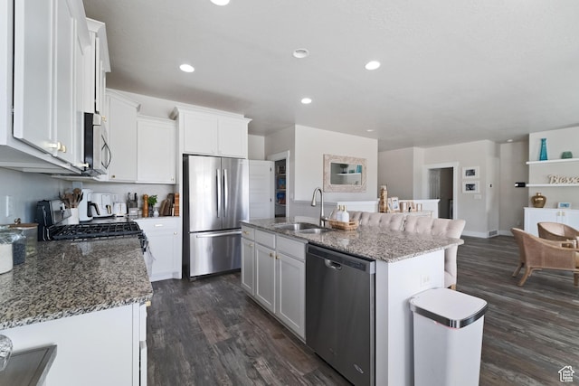6463 W Maple Valley Cir S Unit 1030, West Jordan, UT 84081 - kitchen with light stone countertops, a sink, appliances with stainless steel finishes, and dark wood-style flooring