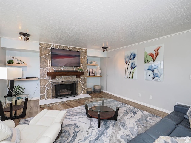 123 Lynnwood Dr, Clearfield, UT 84015 - living area with ornamental molding, a textured ceiling, wood finished floors, and baseboards