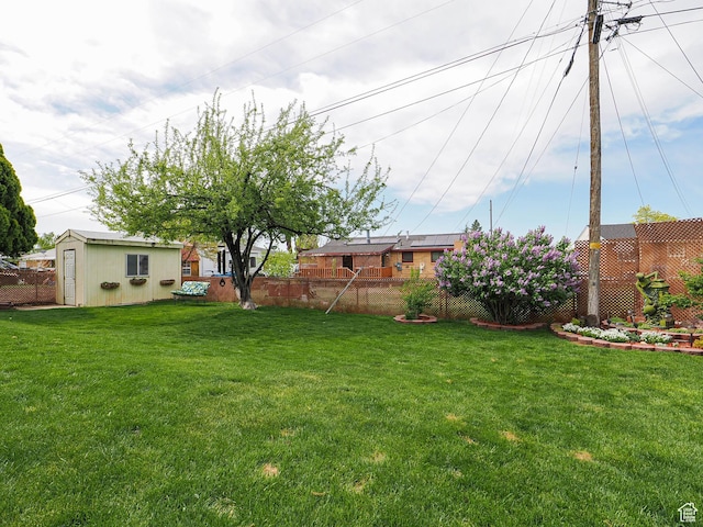 123 Lynnwood Dr, Clearfield, UT 84015 - view of yard with an outbuilding and fence