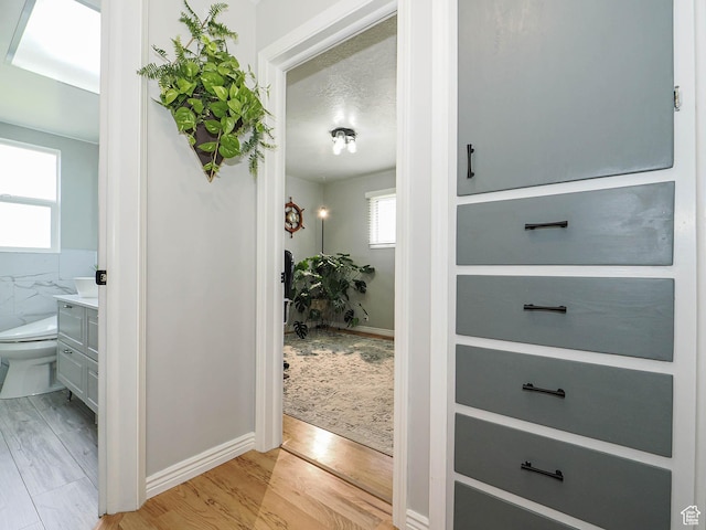 123 Lynnwood Dr, Clearfield, UT 84015 - corridor with light wood finished floors