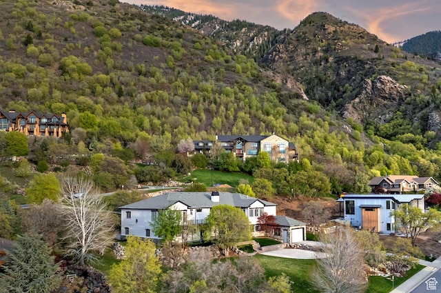 11274 S Eagle View Dr, Sandy, UT 84092 - aerial view at dusk with a mountain view and a view of trees