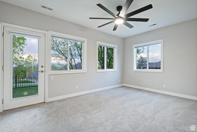 11274 S Eagle View Dr, Sandy, UT 84092 - spare room with visible vents, ceiling fan, and a wealth of natural light
