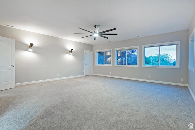 11274 S Eagle View Dr, Sandy, UT 84092 - spare room featuring carpet flooring, a ceiling fan, visible vents, and baseboards