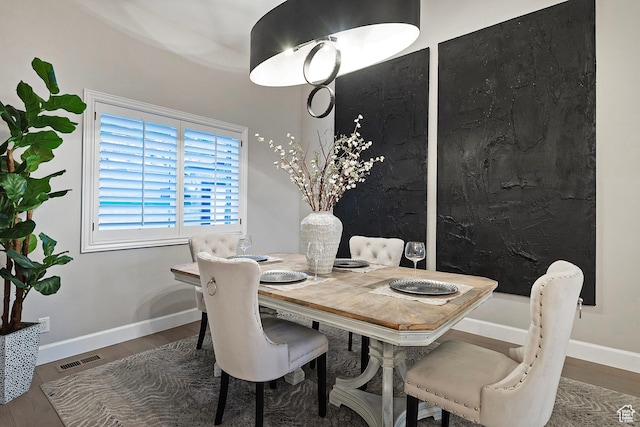 11274 S Eagle View Dr, Sandy, UT 84092 - dining area featuring visible vents, wood finished floors, and baseboards