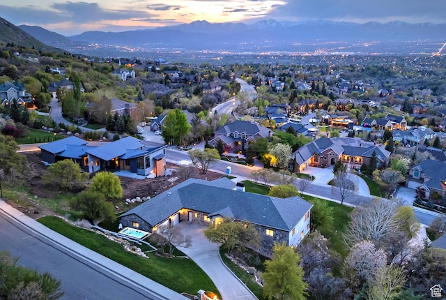 11274 S Eagle View Dr, Sandy, UT 84092 - aerial view at dusk with a mountain view and a residential view