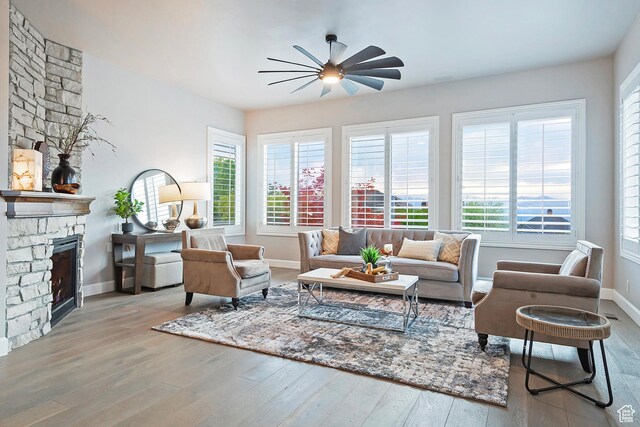 11274 S Eagle View Dr, Sandy, UT 84092 - living area featuring ceiling fan, wood finished floors, and plenty of natural light
