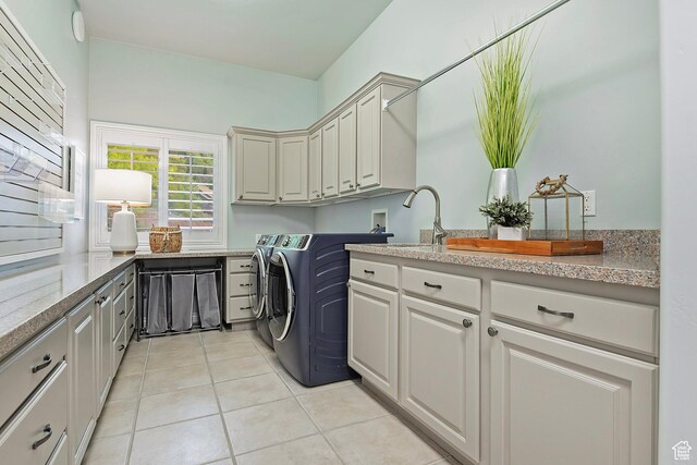 11274 S Eagle View Dr, Sandy, UT 84092 - laundry room with light tile patterned floors, a sink, cabinet space, and washer and clothes dryer