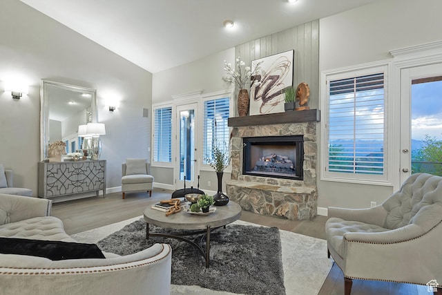 11274 S Eagle View Dr, Sandy, UT 84092 - living area featuring plenty of natural light, baseboards, wood finished floors, and a fireplace