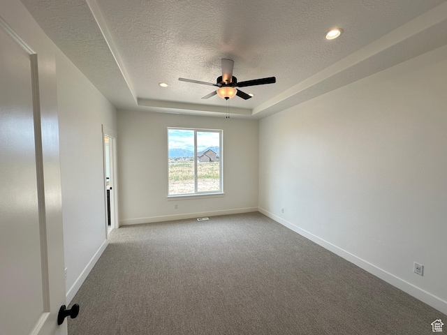 287 E 1150 N Unit 73, Salem, UT 84653 - carpeted empty room featuring a textured ceiling, a raised ceiling, ceiling fan, and recessed lighting
