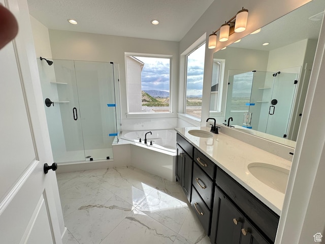 287 E 1150 N Unit 73, Salem, UT 84653 - full bath featuring a shower stall, a garden tub, double vanity, marble finish flooring, and recessed lighting