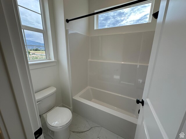 287 E 1150 N Unit 73, Salem, UT 84653 - bathroom with marble look tile flooring and shower / washtub combination