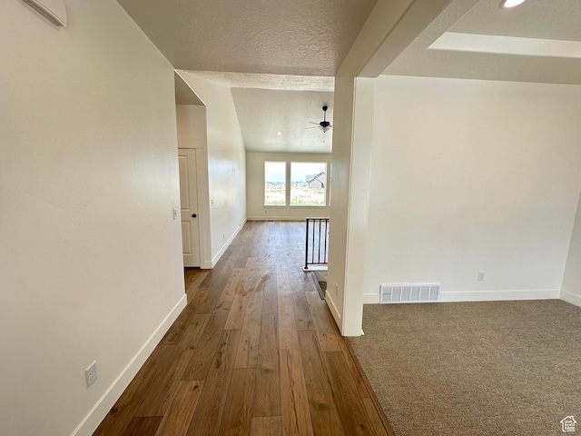 287 E 1150 N Unit 73, Salem, UT 84653 - hall with an upstairs landing, dark wood-type flooring, and a textured ceiling